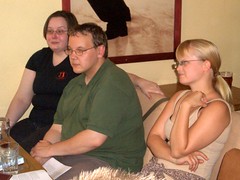 Elina, Jussi and Sofia sitting at the table