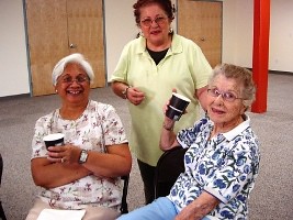Seniors sharing coffee