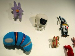 plushies on the wall